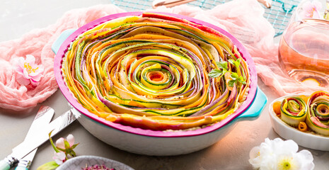Obraz na płótnie Canvas vegetable Spiral tart with zucchini, eggplant, carrot