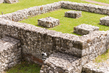 Old foundation from a thousand-year-old building. Archaeological ruins preserved for tourists....