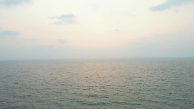 goa Sinquerim Candolim Beach drone birds-eye view into the sunset sun rise drone back.