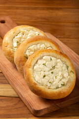 Arabic cheese sfiha on the table.