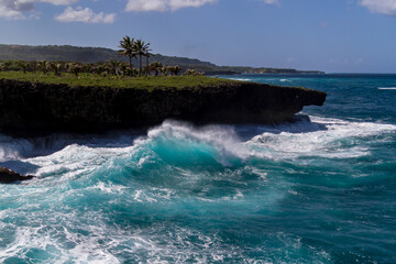 waves crashing on rocks