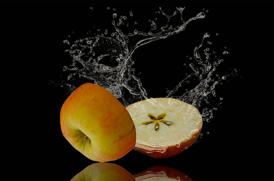 Freshness from cool apple on black background