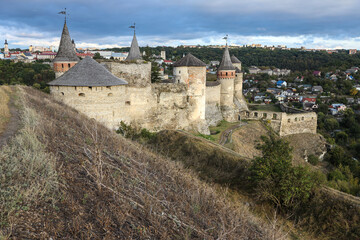 Beautiful view of the old fortress against the background of the modern city