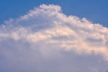 Beautiful white clouds on blue sky background.
