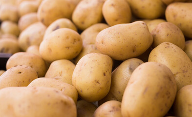 potatoes on counter in market