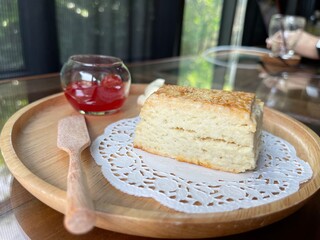Top view closed up of Plain scone with fruit jam on wood table. Cafe concepta