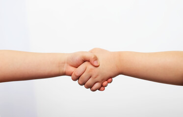 kid hand shake in start partnership concept