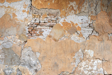 peeling wall texture with exposed brick old masonry