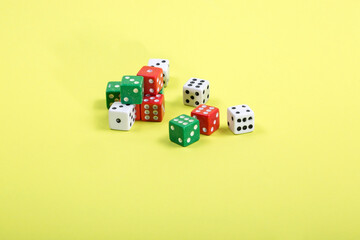 Multicolored Traditional dice on a colored background