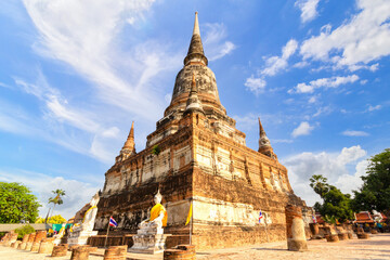 Naklejka premium Beautiful pagoda and buddha statue at Wat Yai Chaimongkol temple, Ayutthaya