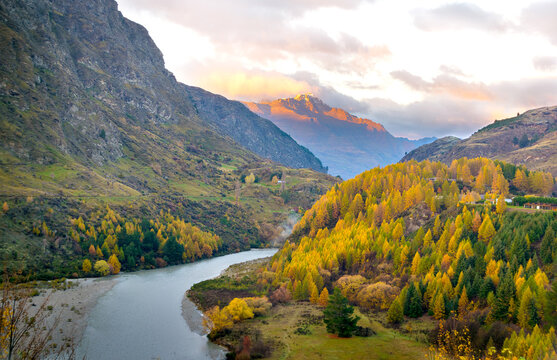 Panoramic beautiful sunrise view with snow mountain     Shotover river from Arthur's Point, Queenstown with autumn colors