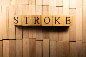 The word Apoplexy stroke was created from wooden cubes. Health and life.