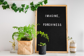 letterboard with the message: imagine, forgiveness