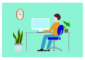 パソコンに向かって仕事をしている男性