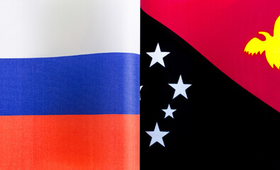 fragments of the national flags of Russia and Papua New Guinea close-up