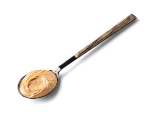 Spoon with tasty peanut butter on white background