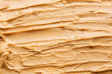 Tasty peanut butter as background