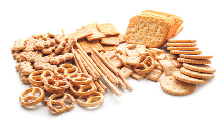 Tasty different crackers on white background