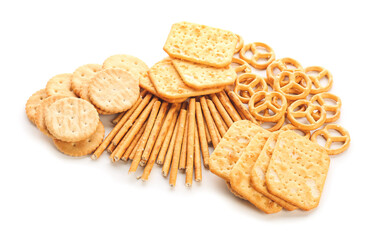 Tasty different crackers on white background