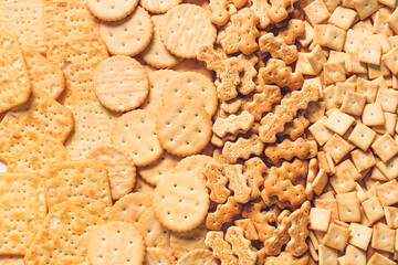 Tasty different crackers as background