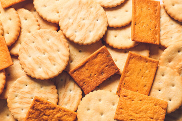 Tasty different crackers as background