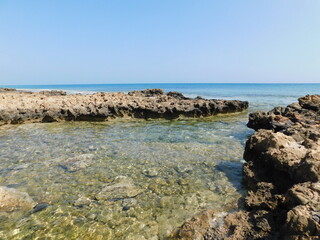 small waves, clear water in the stone sea bay. Protaras. Cyprus. April 2021