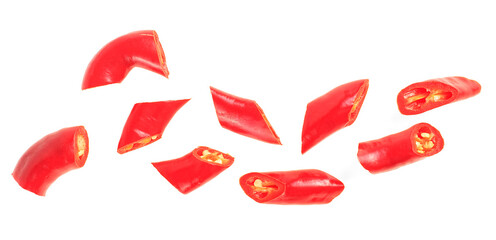 Red chopped chili peppers isolated on a white background, top view. Red chili slices.
