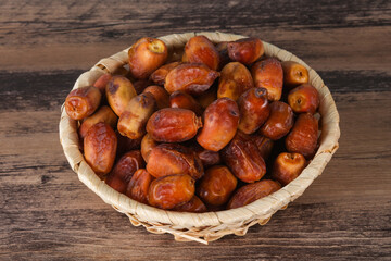 Sweet tasty dry dates in the basket