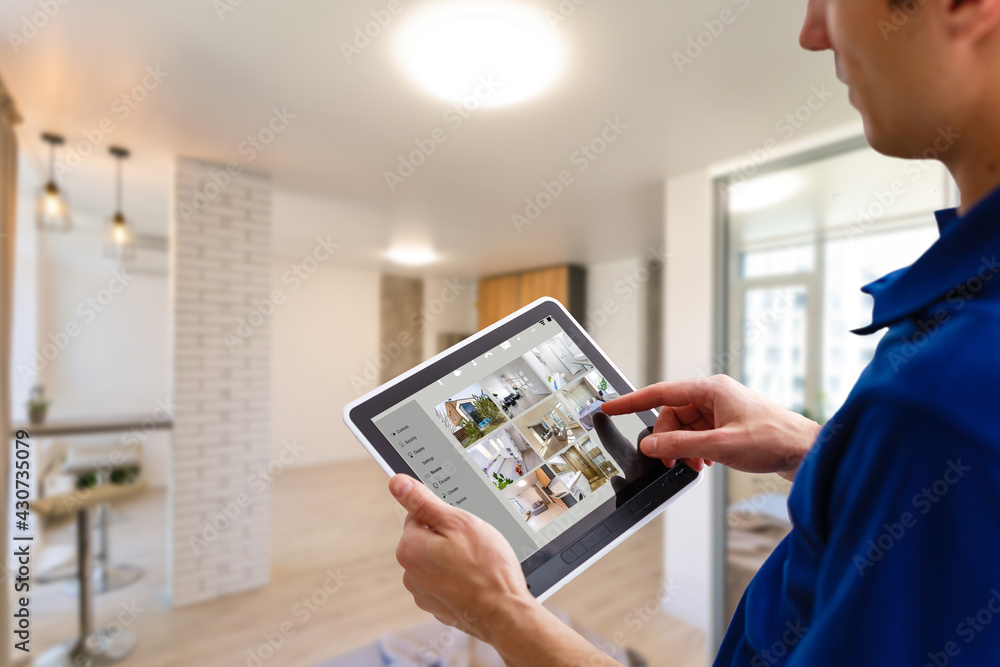 Poster man having home automation control station in a modern home 3d render