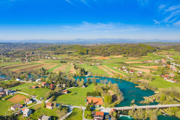 Countryside landscape, bridge over Mreznica river from air, aerial view of Belavici village in Croatia