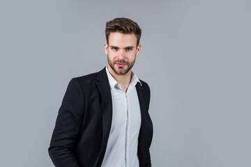 stylish guy with trendy hairstyle wear office suit, atelier