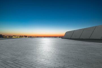 Panoramic skyline and buildings with empty square floor