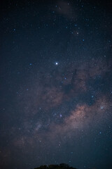 Milky way among stars in the night sky