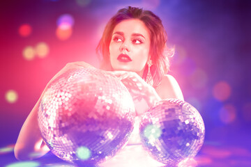 Obraz na płótnie Canvas beautiful lady with disco balls
