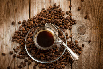 cup of coffee with coffee beans