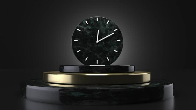 Three stone props with a modern clock with two moving hands in a black room 