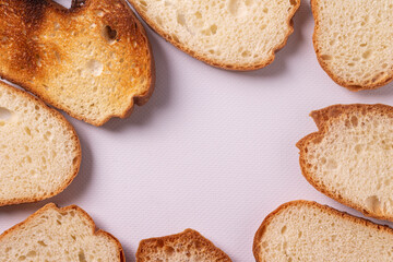 Whole grain bread slices. View from above. Food background.