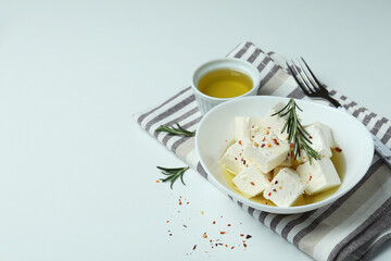 Concept of tasty food with feta cheese on white background