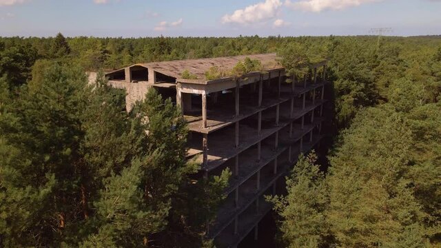 Flyover of KDF Prora Ruins on the island of R&uuml;gen in the Baltic Sea near Binz. They are hidden in the woods.