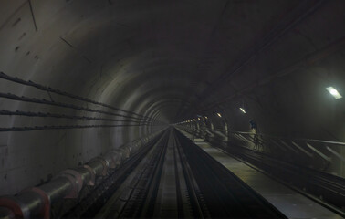 Underground one way metro subway tunnel with blur effect. defocus
