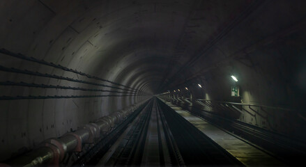Underground one way metro subway tunnel with blur effect. defocus