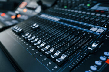 Close up view of radio mixing desk with professional sound equipment