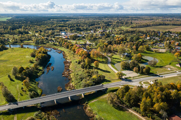 Aerial view of Skrunda town and bridge over Venta river, Latvia.
