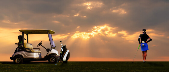 Professional woman  stand near Golf cart and golf club putting on green grass at course with sun...