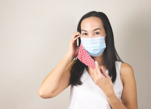  Wearing Double Layer Or Two Face Mask For Better Protection From Coronavirus Or Covid-19 Outbreak - Concept Of Safety, Healthcare, Medical And Hygiene.