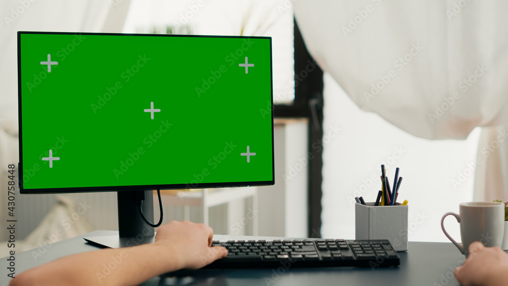 Poster pov of man hands typing on keyboard for marketing project using computer with mock up green screen c