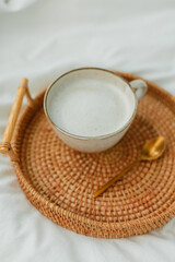 Breakfast in bed, cappuccino, wicker tray, spring, home decor. Cozy.