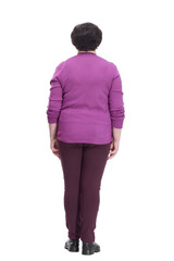 full-length.casual elderly woman in a purple blouse.