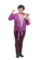 in full growth.happy senior woman with gift box.