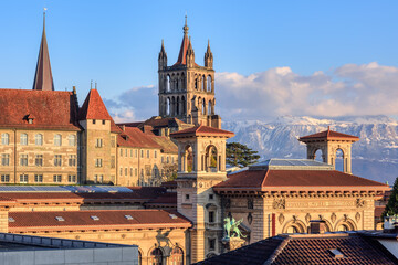Lausanne city and the snow covered Alps mountains, Switzerland - obrazy, fototapety, plakaty